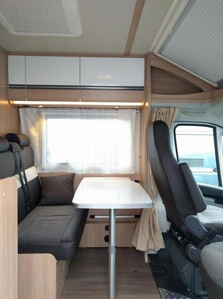 2-Wohnmobil Sunlight T66 Teilintegriert mit Einzelbetten