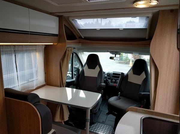 3-Wohnmobil Sunlight T66 Teilintegriert mit Einzelbetten
