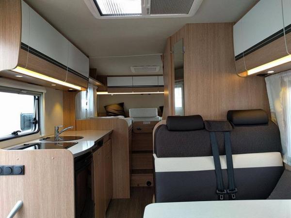 4-Wohnmobil Sunlight T66 Teilintegriert mit Einzelbetten
