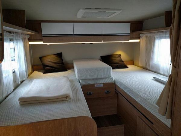 5-Wohnmobil Sunlight T66 Teilintegriert mit Einzelbetten