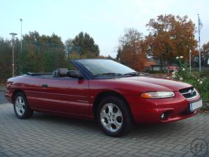 Cabriolet für Hochzeitsfahrten im Ems-Weser-Elbe-Gebiet mieten mit Chauffeur u. Seidenblumengesteck.